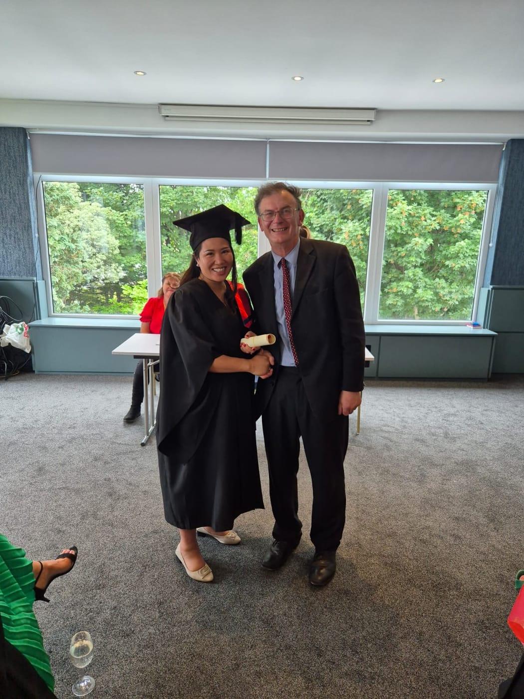 Oanh in her cap and gown, holding her scroll and shaking hands at the award ceremony